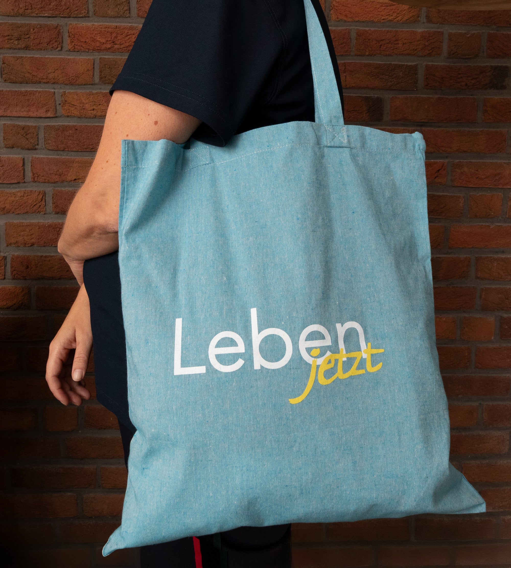 Tasche ‚Leben jetzt‘ mit recycelter Baumwolle